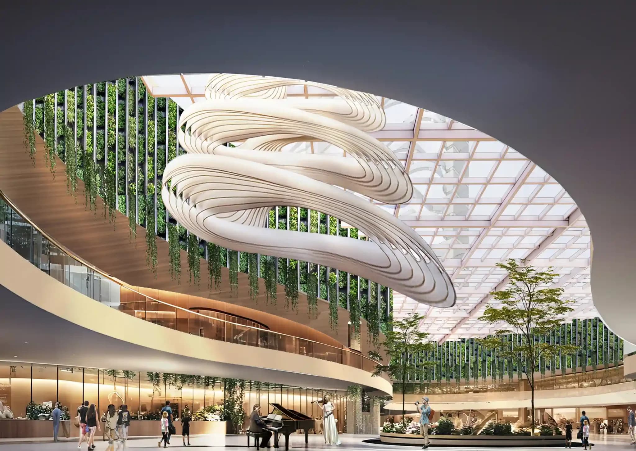 Modern mall interior with a large, artistic, white, swirling sculpture and a green wall.